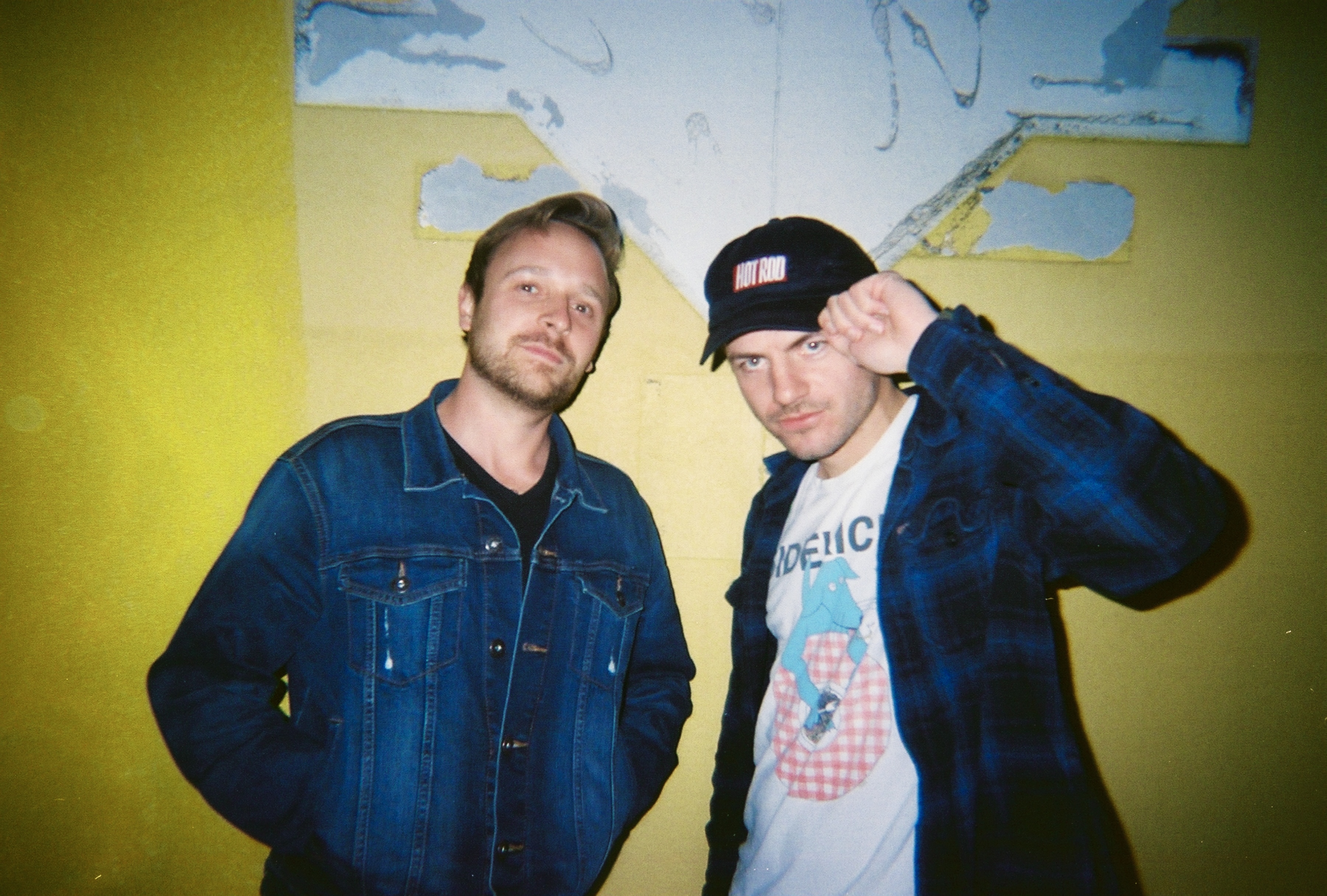 two handsome men posing